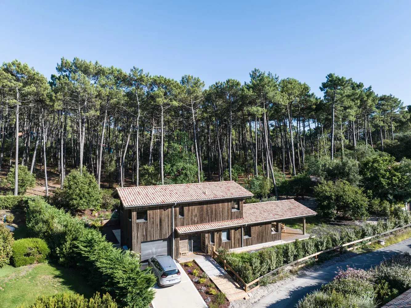 Maison d'architecte et son jardin arboré